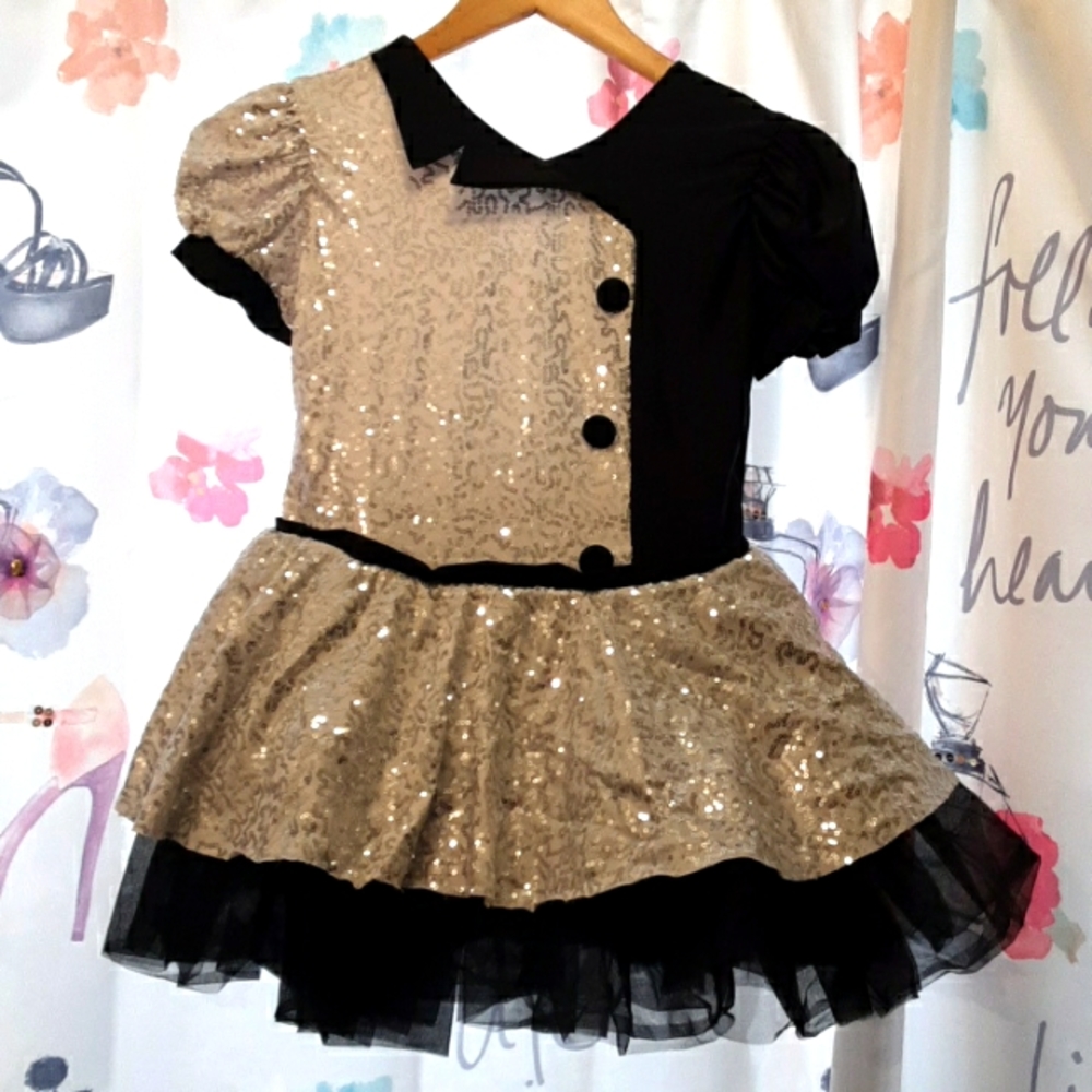 Revaluation dancewear dress. Black tulle and white sequined.